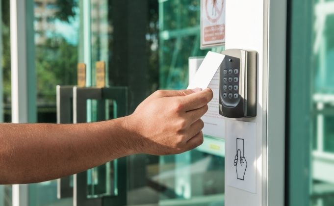 card-presented-at-card-reader-and-keypad-at-access-control-point-at-main-building-entrance